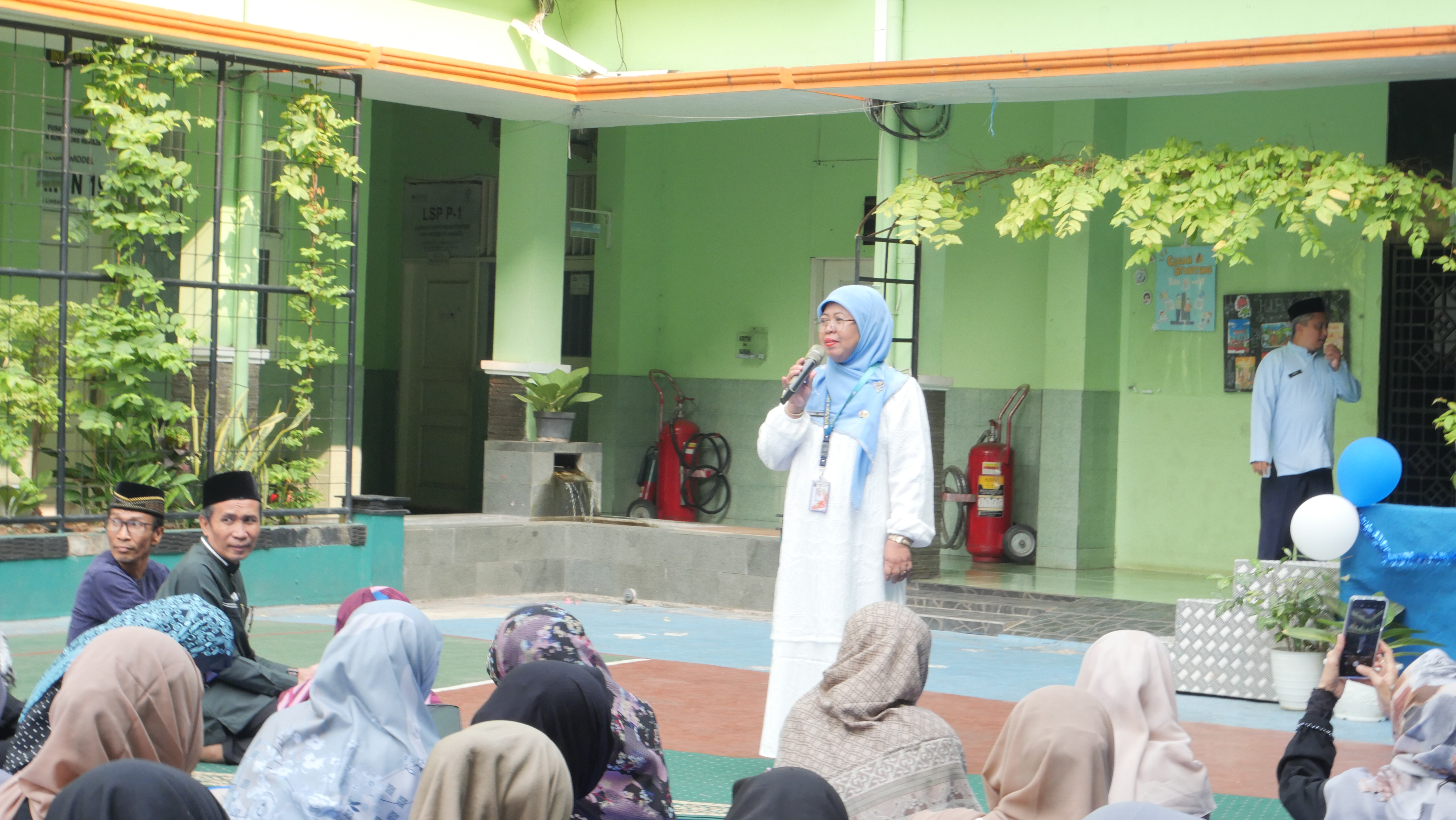 Sambutan Ibu Kepala SMKN 19